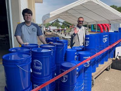 All members received a 5-gallon pain as an appreciation gift.