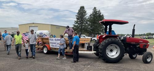 Employees of Polk-Burnett Propane offered wagon rides from parking lots.