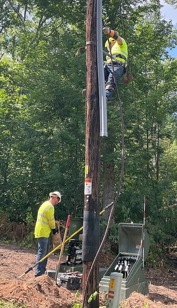 Polk-Burnett line crew, underground power line conversion